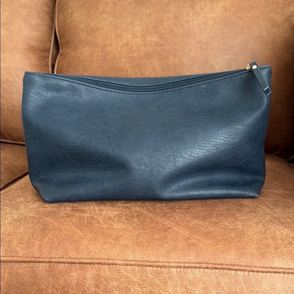 Navy Blue vegan leather Travel Bag with Sleek Design and Zipper Closure